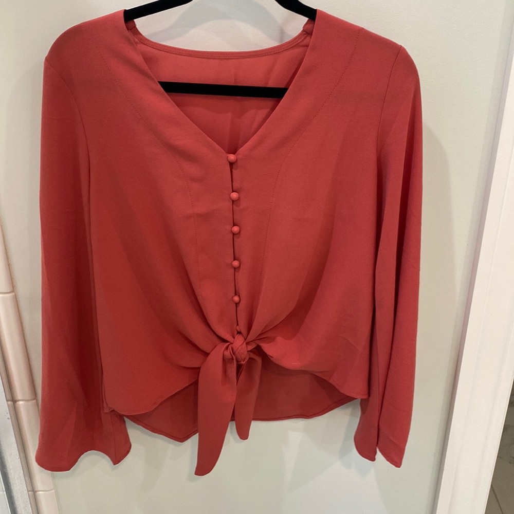 Front button and tie blouse